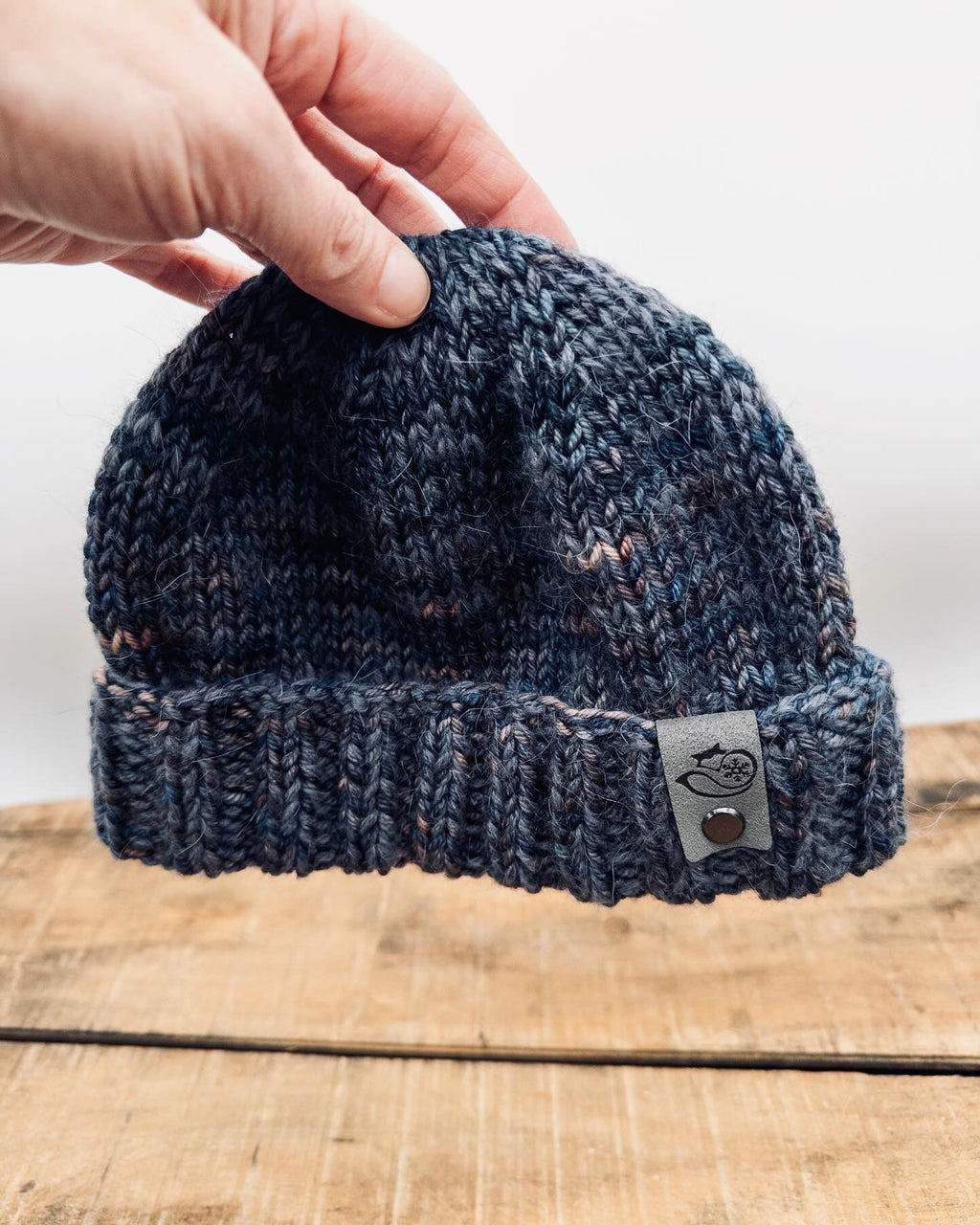 Handmade Scorpio fisherman beanie in merino wool and mohair with folded brim and minimalist fit